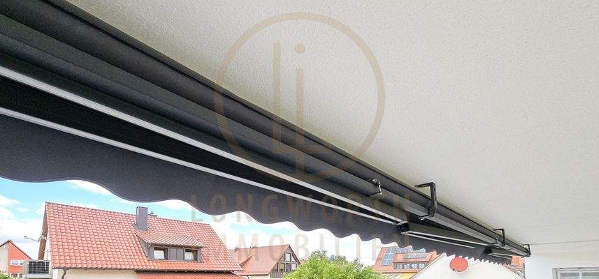 7-MFH-Garatenseite-Terrasse-EG-Markise