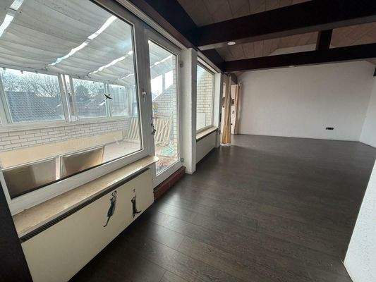 Wohnzimmer mit Wintergarten