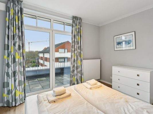 Schlafzimmer mit Balkon