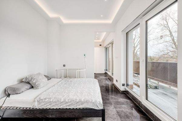 Schlafzimmer mit Ankleide im Obergeschoss