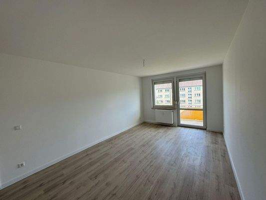 Schlafzimmer mit Balkonzugang