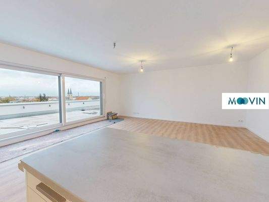 Ansicht I: Blick von der offenen Küche in den Wohnbereich