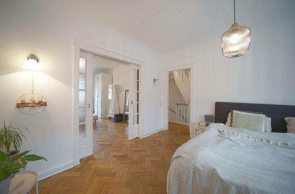 Schlafzimmer mit Ankleidezimmer