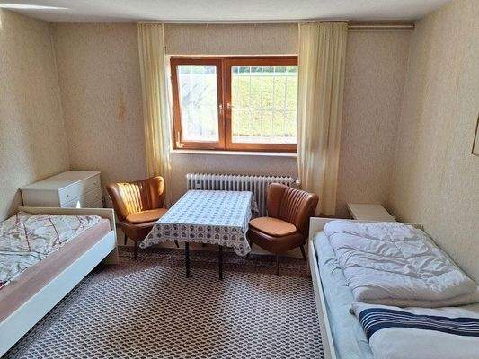 Schlafzimmer im Kellergeschoss