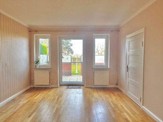 WE1 Wohnzimmer mit Zugang zur Terrasse