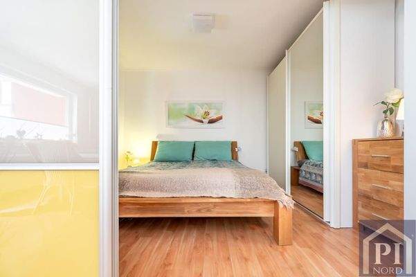 Schlafzimmer mit Schiebetür