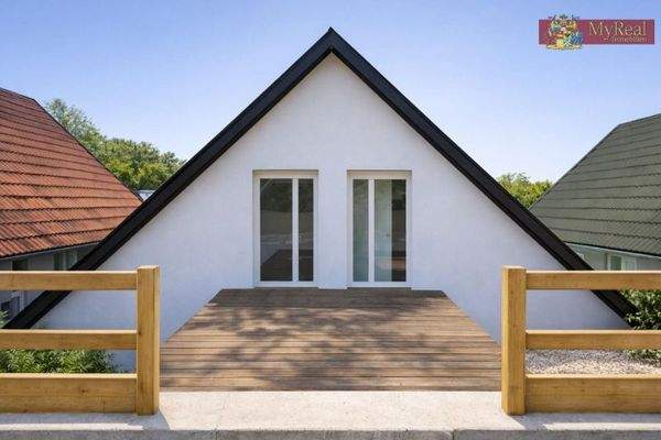 Rückansicht der Wohnküche und Schlafzimmer