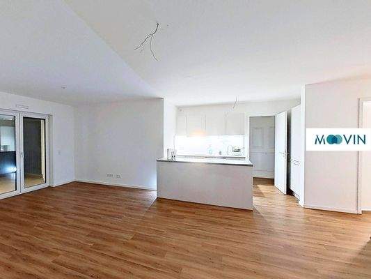 Ansicht III: Wohn- und Esszimmer mit offenem Küchenbereich