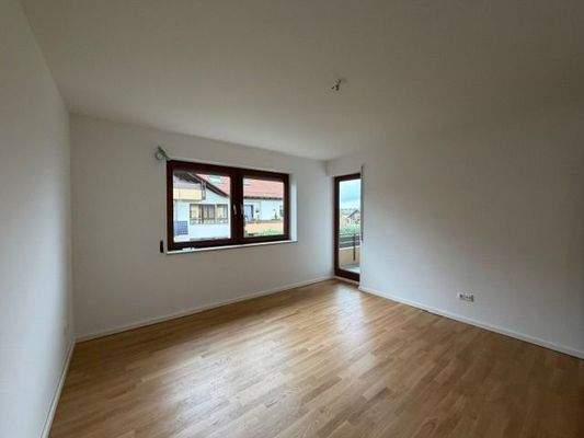 Eltern-Schlafzimmer mit Balkon nach Norden