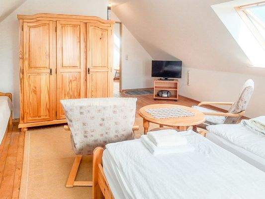 Eines der Pensionszimmer