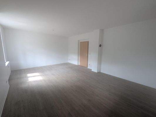 Wohnzimmer im Erdgeschoss (4-Raum Wohnung)