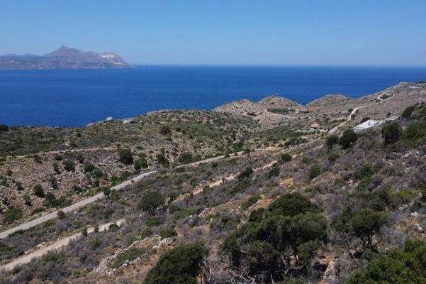 Kreta, Kokkino Chorio: Ruhiges Hanggrundstück mit ewigem Meerblick zu verkaufen