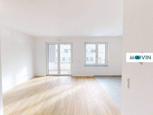 Ansicht I: Wohn- und Essbereich mit angrenzendem Balkon