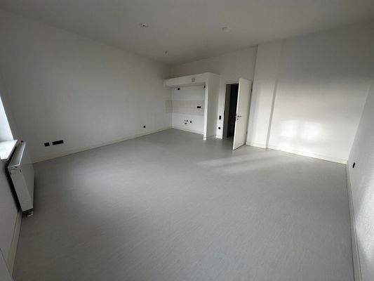 Wohnzimmer mit Kochnische