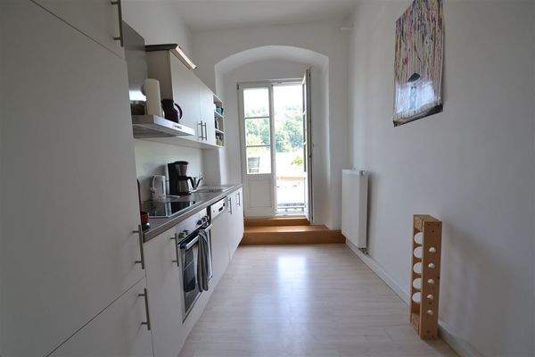 Küche/Essbereich mit direktem Zugang zur Terrasse 