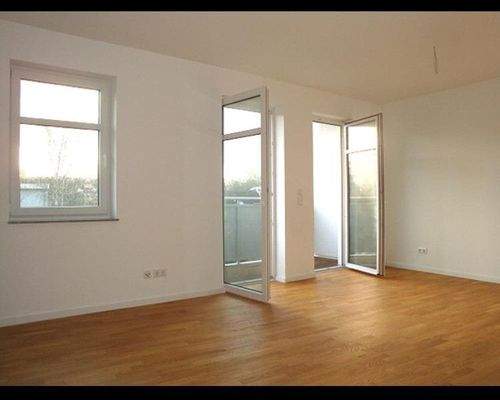 Wohnzimmer mit Balkon