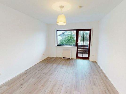 Schlafzimmer mit Zugang zum Balkon