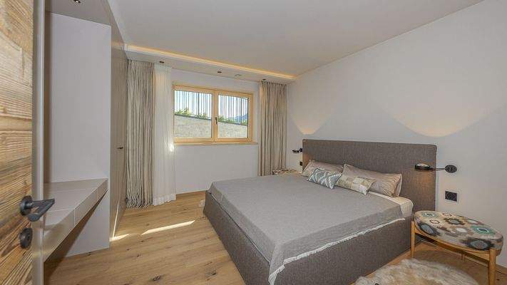 KITZIMMO-Luxuriöse Gartenwohnung mit eigenem Wellnessbereich - Immobilien Brixen.