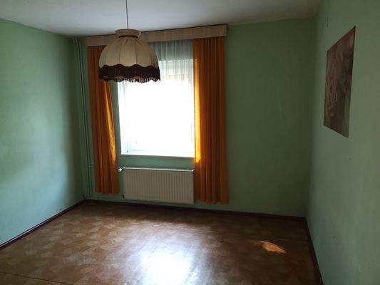 Haus 1 - Schlafzimmer im Erdgeschoss.jpg