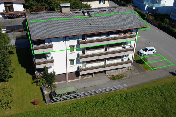 Luftaufnahme eines Wohngebäudes in Vorstadt.png