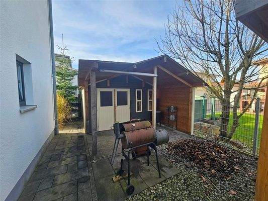 Gartenhütte und Grillplatz