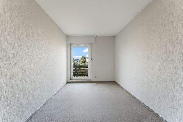 Schlafzimmer mit Balkonzugang