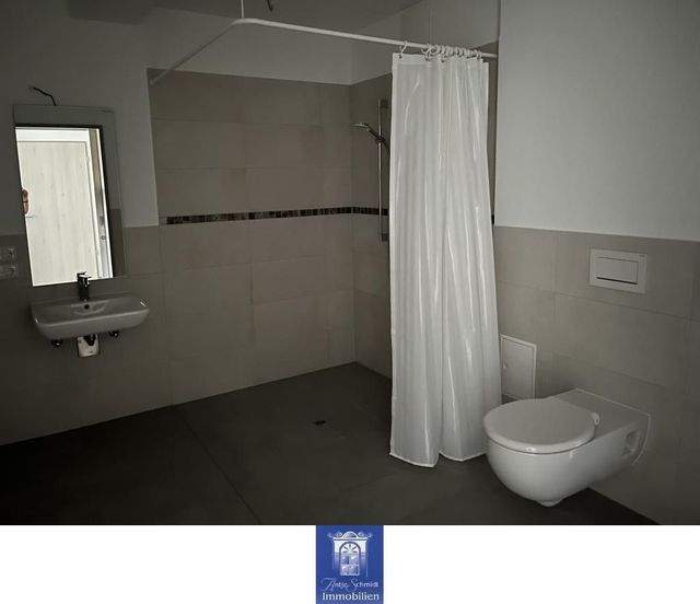 Rollstuhlgerechte Wohnung mit Fußbodenheizung, edlem Bad, moderner EBK, Terrasse! - Foto 3