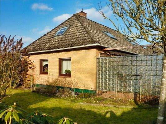 Garten mit Terrassenglaswand