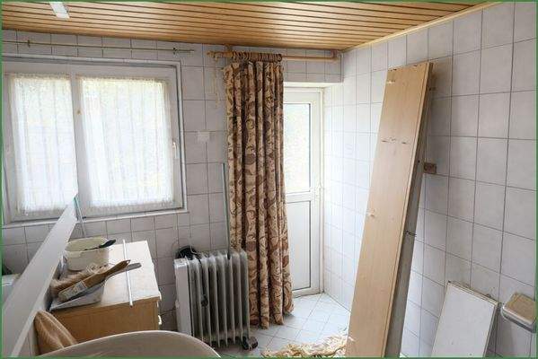 Badezimmer Erdgeschoss mit Zugang zum Garten