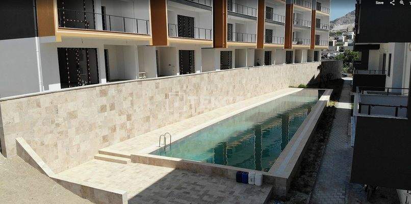 Newly-Built Apartments in a Complex with Pool in Kuşadası