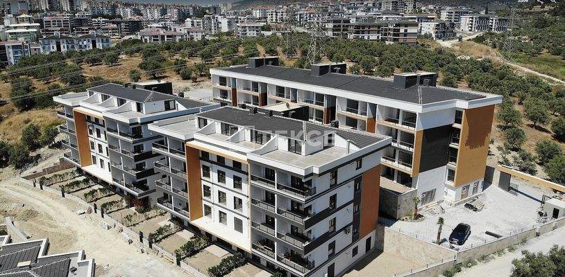 Newly-Built Apartments in a Complex with Pool in Kuşadası