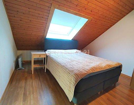 Das zweite Schlafzimmer im Dachgeschoss