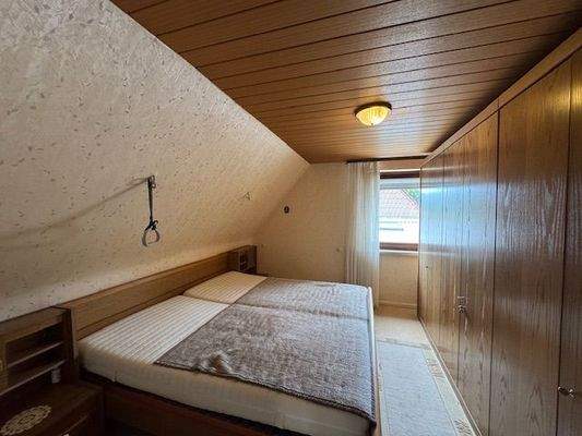 Schlafzimmer I im DG