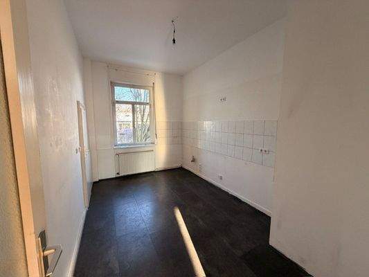 Küche mit Fliesenspiegel