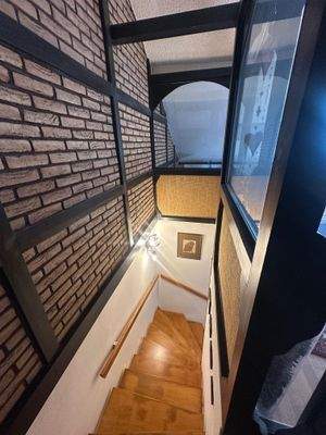 Treppenaufgang zum ausgebauten Dachgeschoss