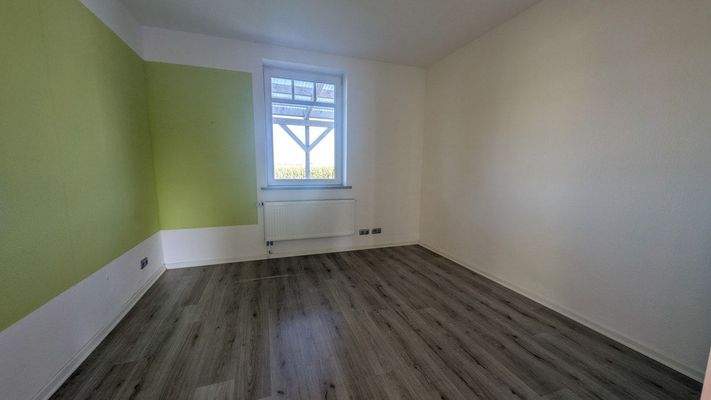 Schlafzimmer in Wohnung 2 im EG