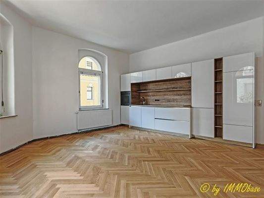 Wohnzimmer mit integrierter Küche