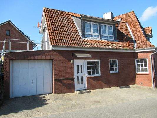 Seiteneingang mit Garage