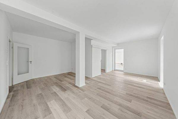 Wohnzimmer Blick auf Balkon & Küche Blick nach Osten