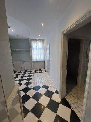 Garderobe + Herrentoilette