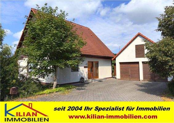 Einfamilienhaus und Doppelgarage