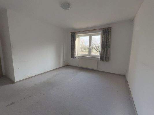 Schlafzimmer mit Blick ins Grüne