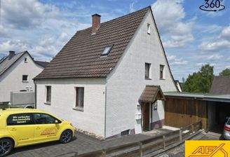 Doppelhaushälfte mit Garage und Garten