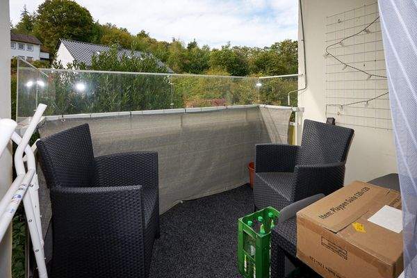 Loggia/Balkon an Wohnzimmer