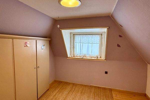 Zimmer im Dachgeschoss.