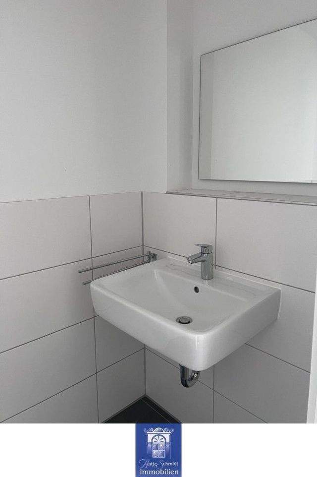 Modern ausgestattete Familienwohnung mit Balkon und Fußbodenheizung! - Foto 4