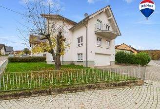 RE/MAX Immobilien DeLux Zweifamilienhaus Lebach - Steinbach 