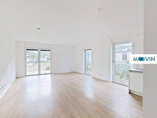 Ansicht I: Wohn- und Esszimmer mit offenem Küchenbereich