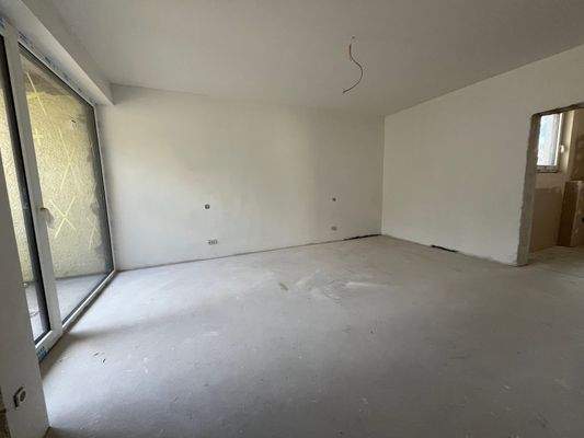 Elternschlafzimmer mit Balkon und Badezimmer