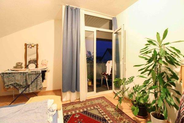 Schlafzimmer mit Balkon